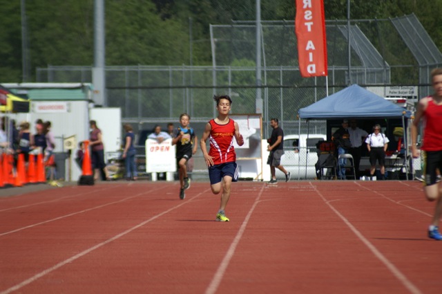 Club Rapide sprinter finishing a race on the track