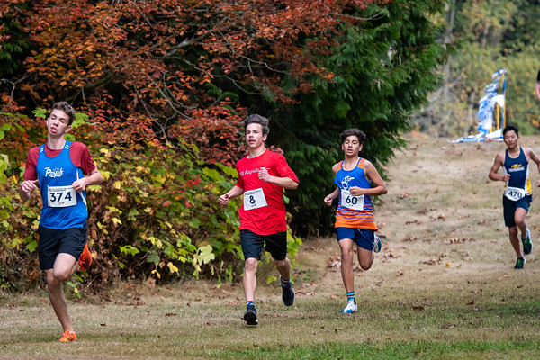 Club Rapide cross country runners in fall foliage